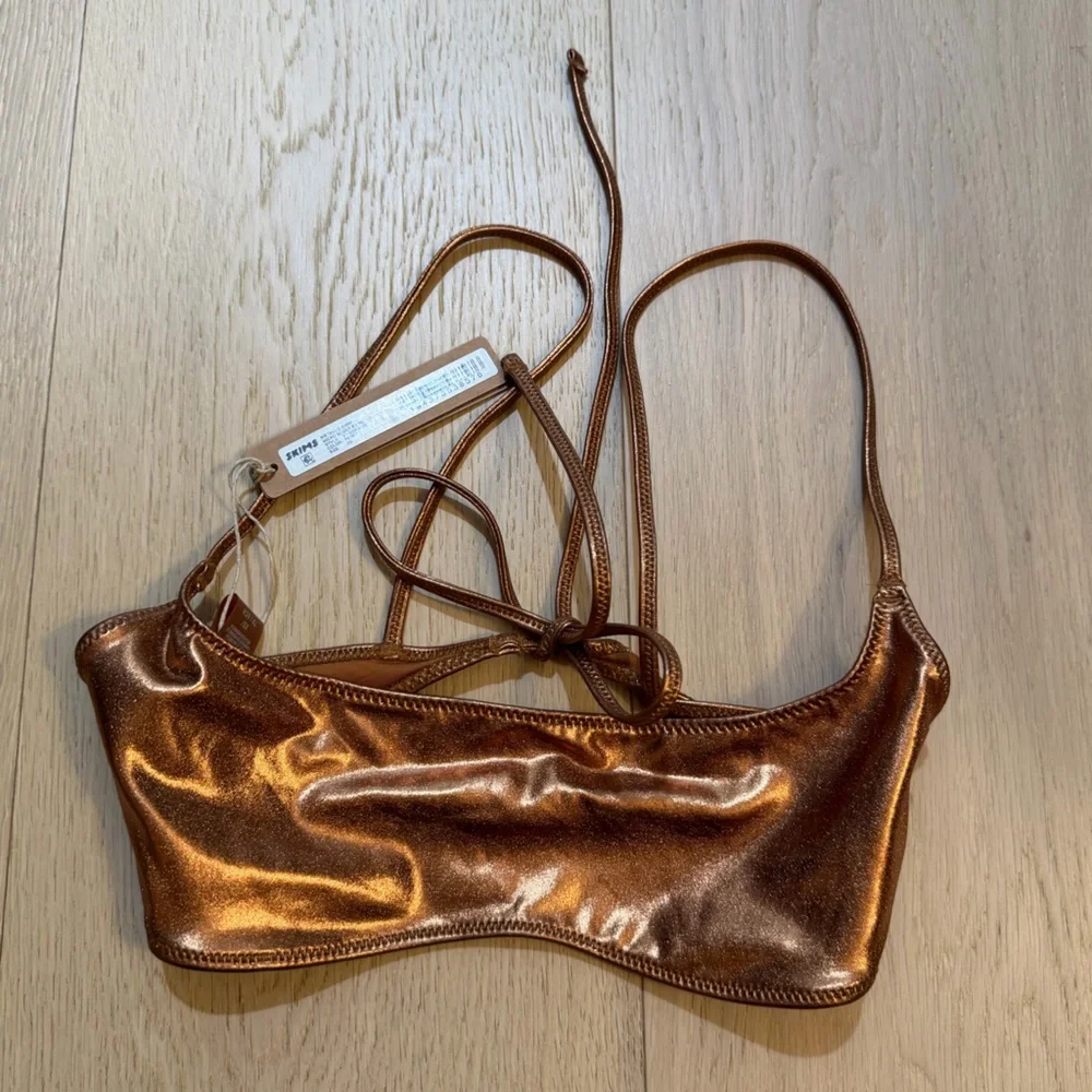 SKIMS shiny metallic